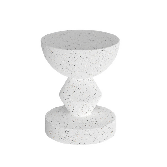 White concrete side table with sculpted modern design