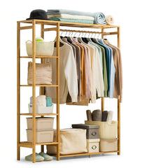 Bamboo open wardrobe clothes rack with sweaters on the rail, side shelves, baskets, storage boxes and slippers