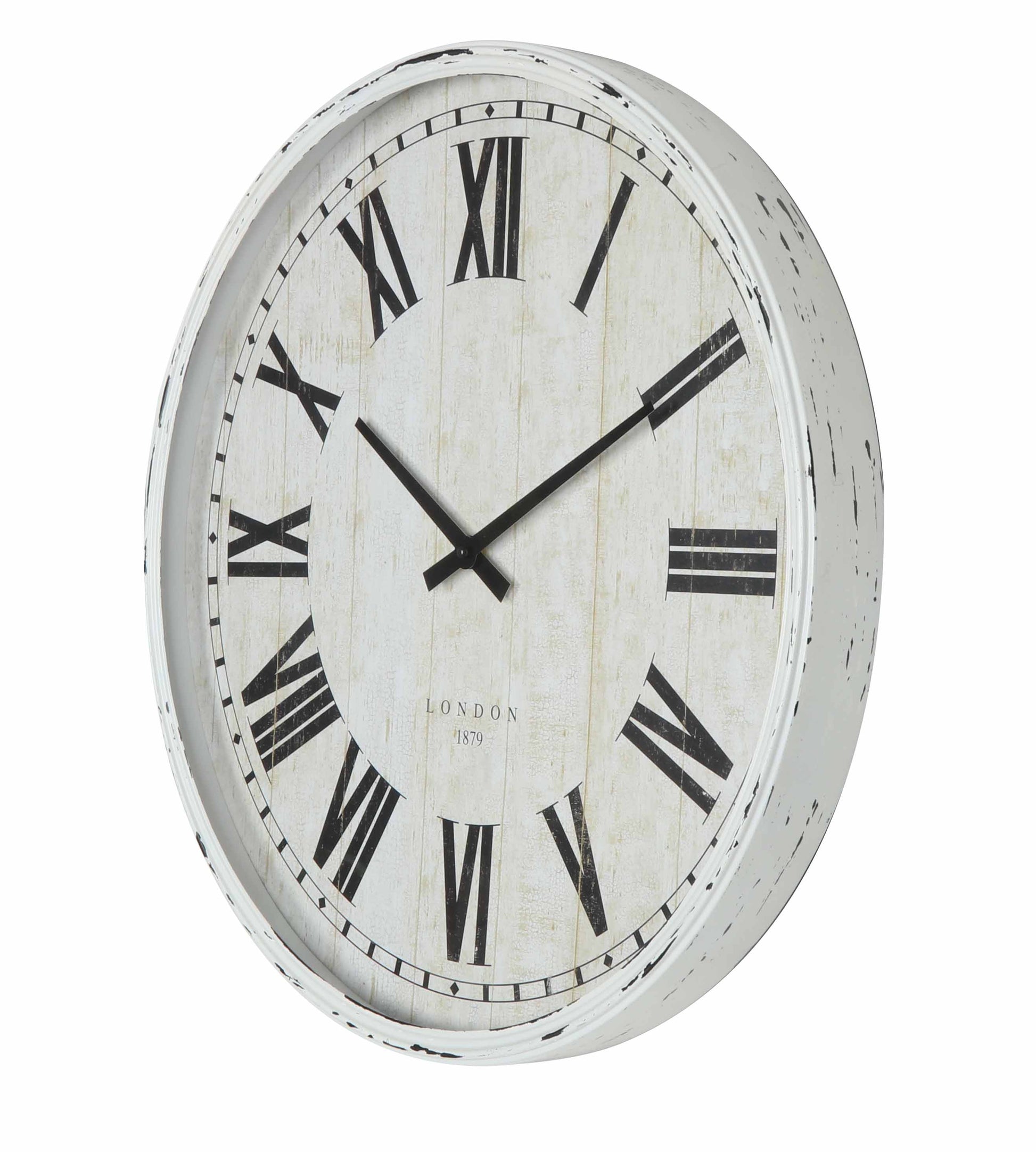 Antique white wall clock styled in a room