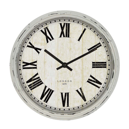 Antique white metal wall clock front view