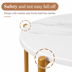 Close up of the edge of a white marble look tabletop resting on the top of a gold metal leg with two circled details