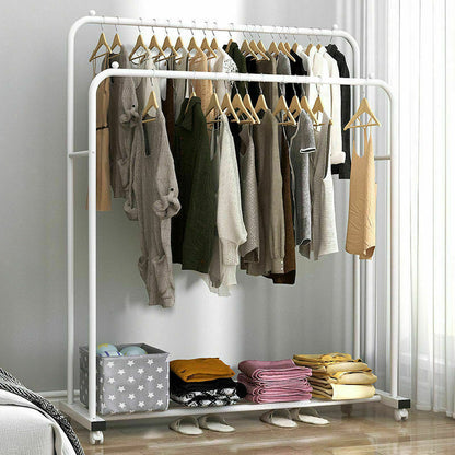 Mobile garment rack holding clothes and shoes