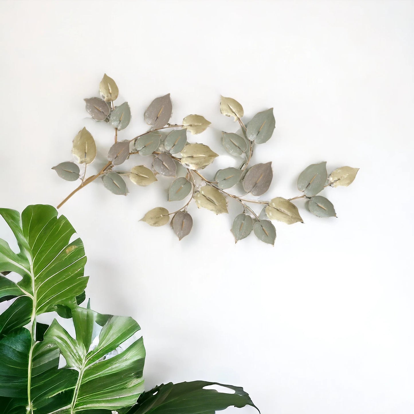 Contemporary gold metal wall art with branch detailing