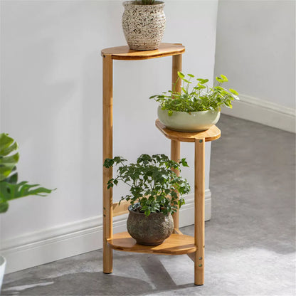 Indoor bamboo corner shelf for small potted plants