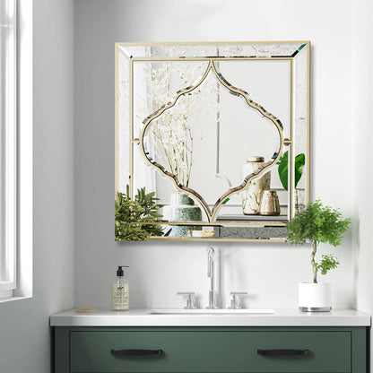 Square wall mirror with golden edge, close-up detail