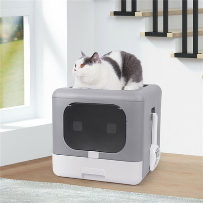 Grey covered litter box with included scoop and filter foam