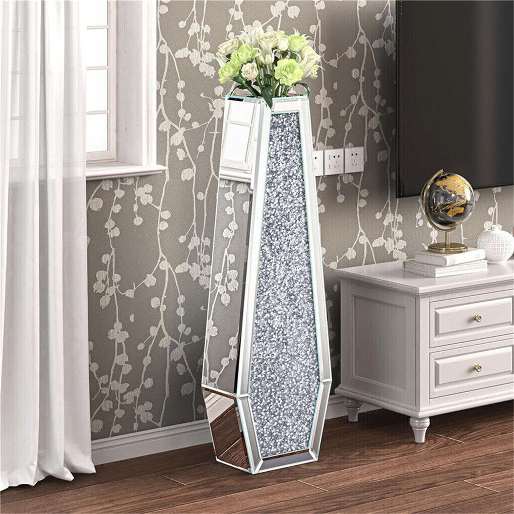 Tall silver decorative vase viewed from the front