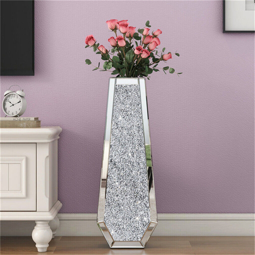 Crushed crystal inlay on a silver floor vase