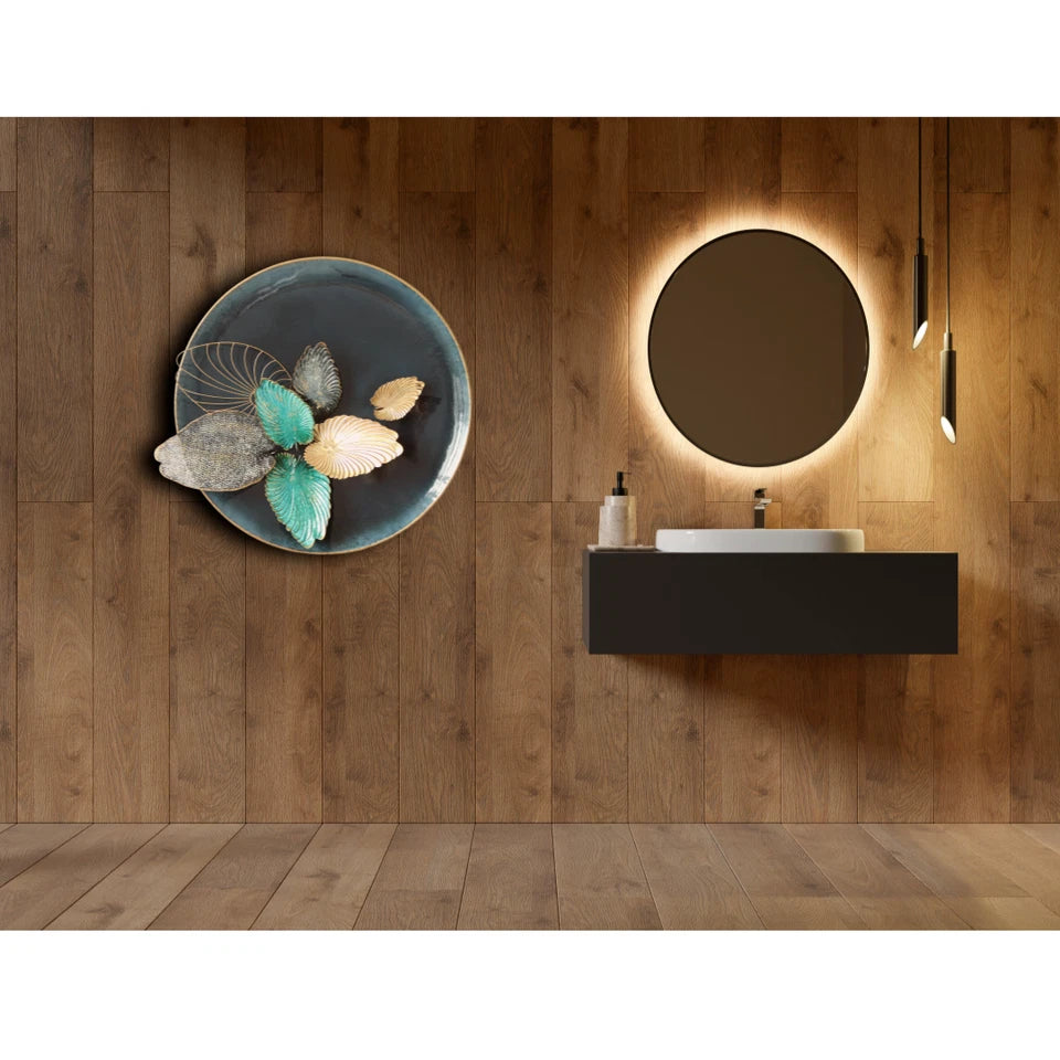 Modern round metal wall décor with layered 3D leaves