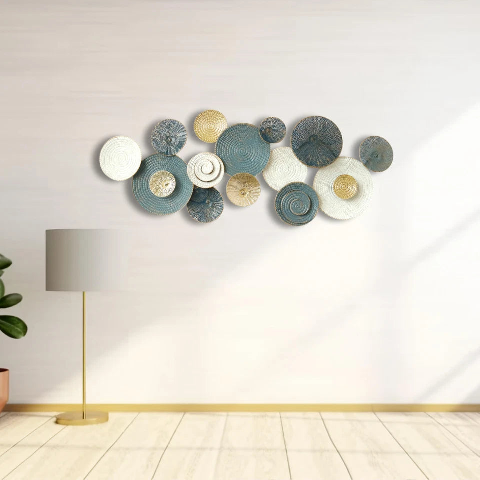 Blue and gold metal wall art styled in a living room