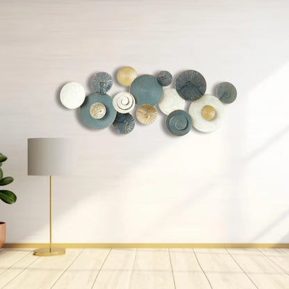 Blue and gold metal wall art styled in a living room