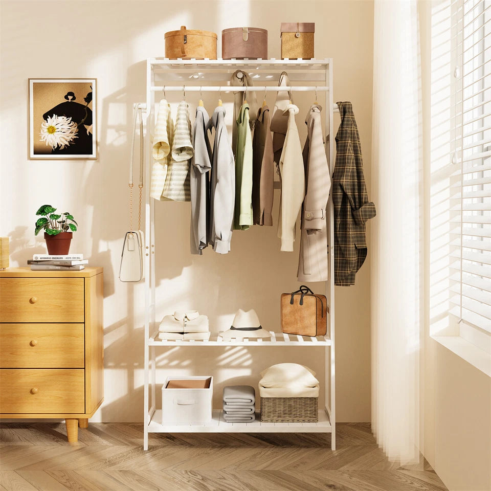 Freestanding bamboo clothing rack with multiple hooks