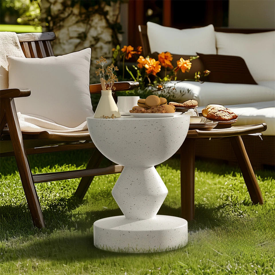 Contemporary concrete side table with artistic sculpted finish