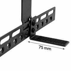 Close up of a black soundbar bracket foot with a grip pad and screws fixing it to a slotted bar